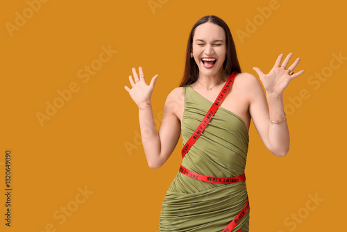 Happy young woman in ribbon...