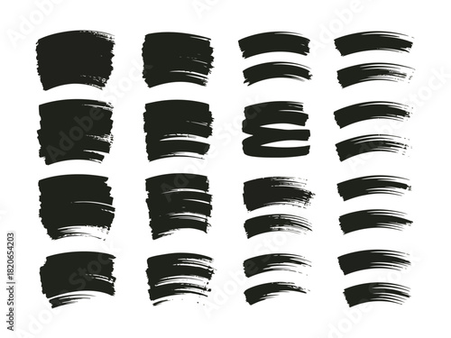Collection of sixteen black brush stroke shapes on a white background