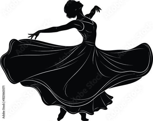 Silhouette of a flamenco dancer in a flowing dress