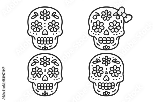 Four decorative sugar skulls with floral patterns and traditional Mexican folk art elements