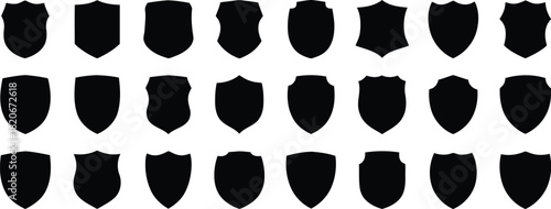 Collection of Black Shield Silhouettes Heraldic Shapes, Security Icons, and Elements