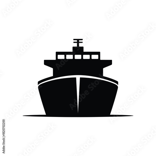 Silhouette of a large cargo ship viewed from the front