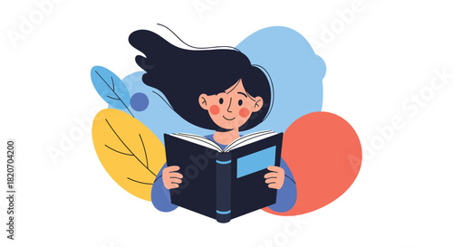 A happy young girl with dark hair flowing in the wind is smiling while reading a book against a colorful abstract background of leaves.