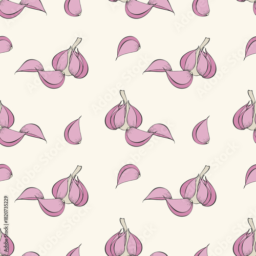 Garlic cloves on beige background. Cooking and spices, aromatic food.