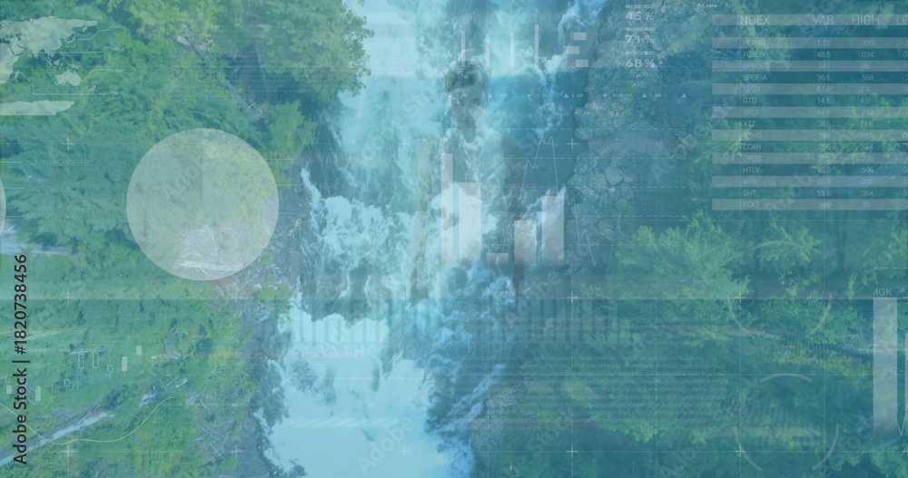 Fototapeta premium Showing tall waterfall centered in forested gorge, flowing with HUD grid markers