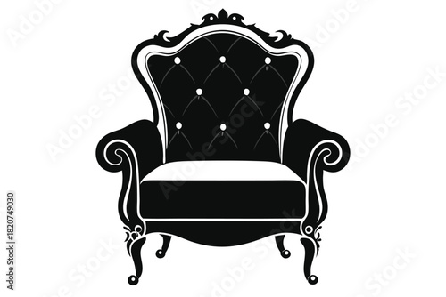 Black button tufted armchair with ornate trim shows elegant and timeless silhouette