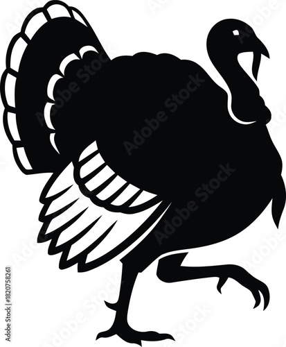 Silhouette of a black turkey with tail feathers fanned out