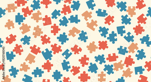 Engaging seamless pattern featuring scattered puzzle pieces in vibrant orange blue and red on a soft cream background.