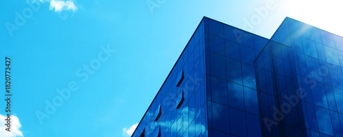 Galss Office Building Facade. Blue Buisness Background. City Architecture Contemporary