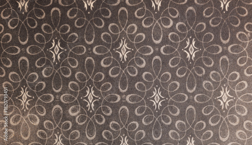 Old wallpaper on the wall. Old wallpaper for texture or background.