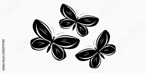 Black butterflies in minimalist design on white background  