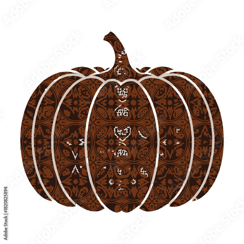 Intricately carved pumpkin with a spooky face on black background