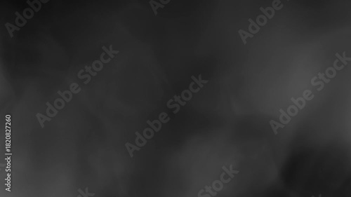 Close up billowing white steam looking like smoke on black background in slow motion, abstract atmospheric footage for magic, fantasy, pollution or mystery projects, no people