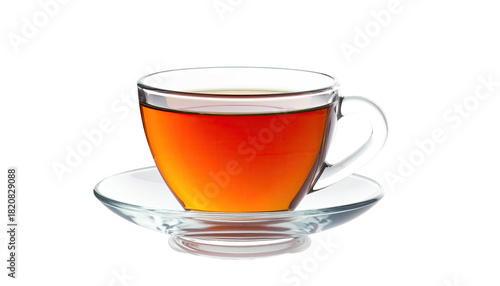 A transparent teacup filled with dark tea, sitting on a matching saucer