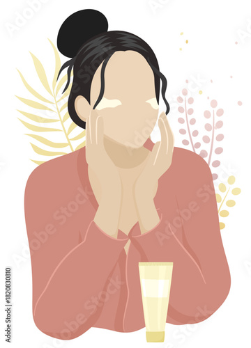 woman applying skincare cream to her face while holding a tube, with subtle botanical elements enhancing the soft wellness theme.