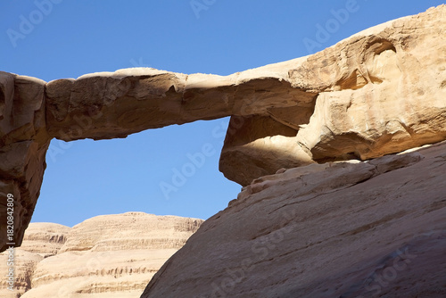 Natural arch or rock arch at Wadi Rum, Jordan
