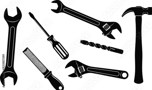 Silhouette illustration of various construction hand tools including wrench, screwdriver, hammer, file and drill bit, isolated black icons for industry design