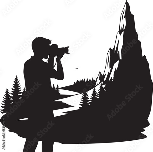 Silhouette of photographer capturing majestic mountain landscape with trees and river