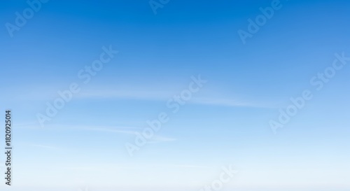 Clear blue sky with subtle gradient and barely visible wispy clouds, ideal for background or copy space.