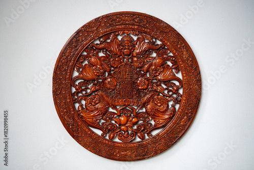 Intricate wooden wall decor showcasing traditional artistry