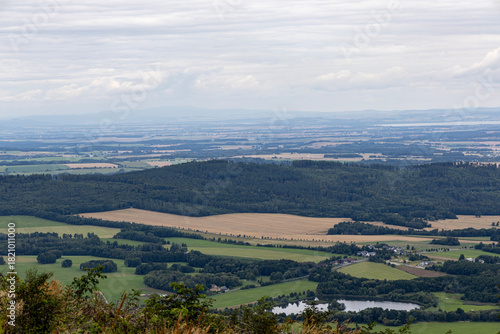 Fototapeta Naklejka Na Ścianę i Meble -  Opawskie Mountains, Poland. View from the summit to the mountain valley of the Czech Republic and Poland.