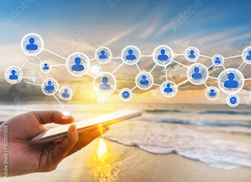 Hand Holding Smartphone with Social Network Icons for Global Connecting Concept