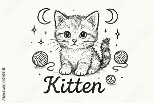 Cute kitten is sitting on a piece of paper with yarn around it