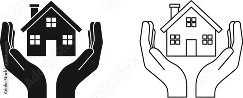 Hands protecting houses a symbol of security and home ownership