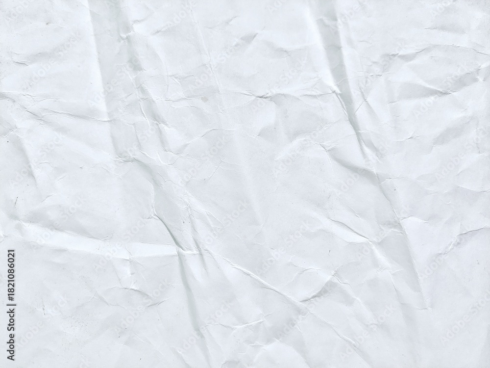 Fototapeta premium White paper texture with crumpled creases and soft shadows. Old white kraft paper background showing natural folds.