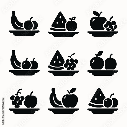 Silhouette plates with various fruits: banana, apple, watermelon, grapes