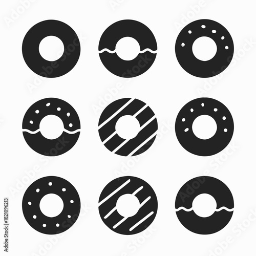 Set of nine black donut icons with various patterns