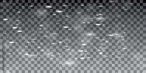 An illustration of falling snowflakes on a dark transparent background