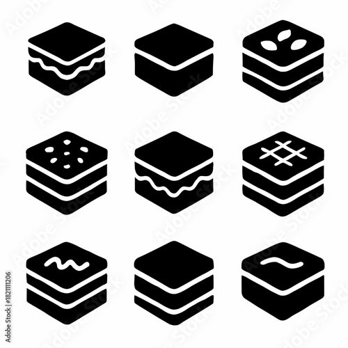 Set of nine black and white layer cake icons with decorative toppings