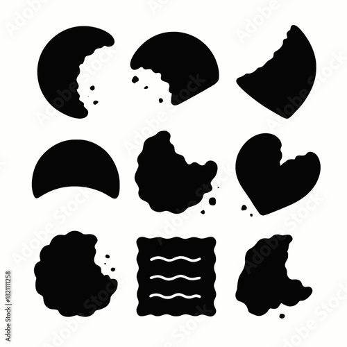 Silhouette of various bitten cookie shapes with crumbs in black