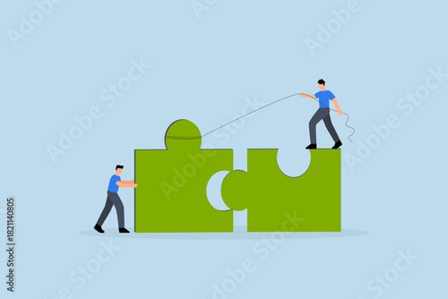 Jigsaw puzzle connection, businessman help connect jigsaw puzzle.