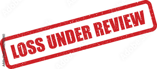 Distressed rectangular rubber stamp with bold text LOSS UNDER REVIEW showing an official process status