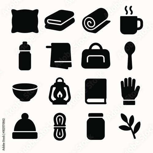 Set of 16 black silhouette icons of everyday objects and essentials
