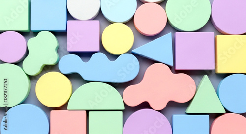 Pastel colored geometric shapes in a repeating pattern for background design