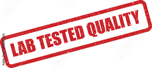 Grungy red rectangular rubber stamp prominently displaying text that signifies confirmed lab tested quality for superior product assurance