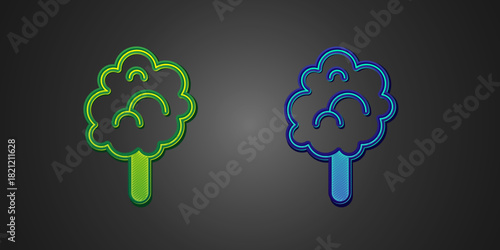 Green and blue Cotton candy icon isolated on black background. Vector