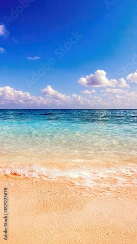 A serene tropical beach scene with clear turquoise water gently lapping onto a golden sandy shore. The bright blue sky is adorned with fluffy white clouds, crea