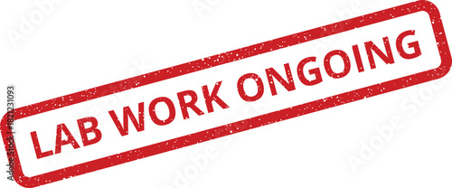 This red rectangular rubber stamp, displaying a noticeable distressed texture, clearly signals that specific medical laboratory work is currently in progress