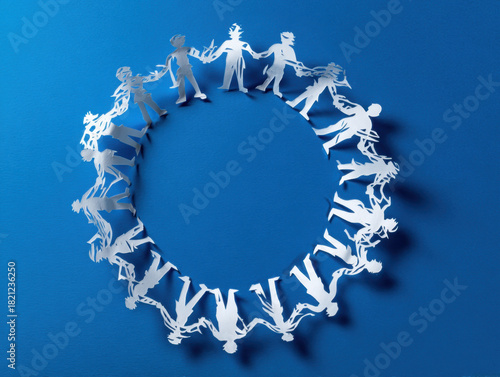 Wallpaper Mural Circle of paper cutout figures holding hands symbolizes unity and teamwork against blue background, creating sense of community and togetherness Torontodigital.ca