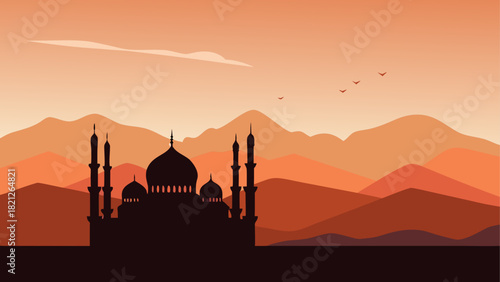 Silhouette of mosque with mountains in background
