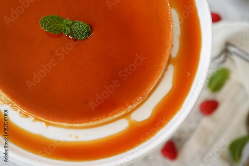 Homemade Flan | Creme caramel pudding served with raspberries