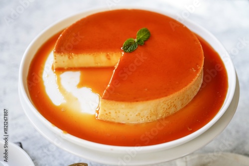Homemade Flan | Creme caramel pudding served with raspberries