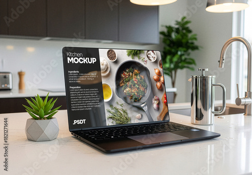 Laptop on kitchen table top. Web design mockup