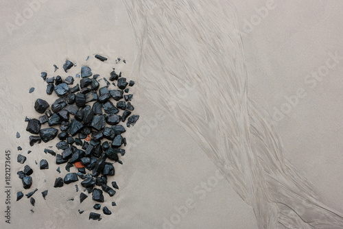 Texture of the sand surface on the beach after low tide.