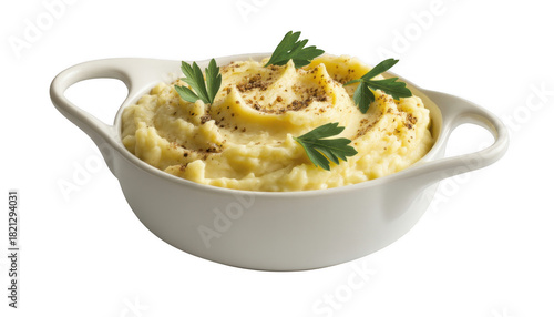 Creamy mashed potatoes in a white serving dish garnished with parsley and pepper isolated on a transparent background