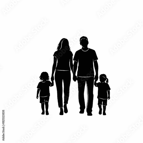 Silhouette of a family of four walking together holding hands.